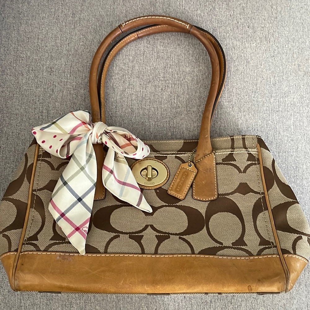 Tan leather and canvas COACH tote.